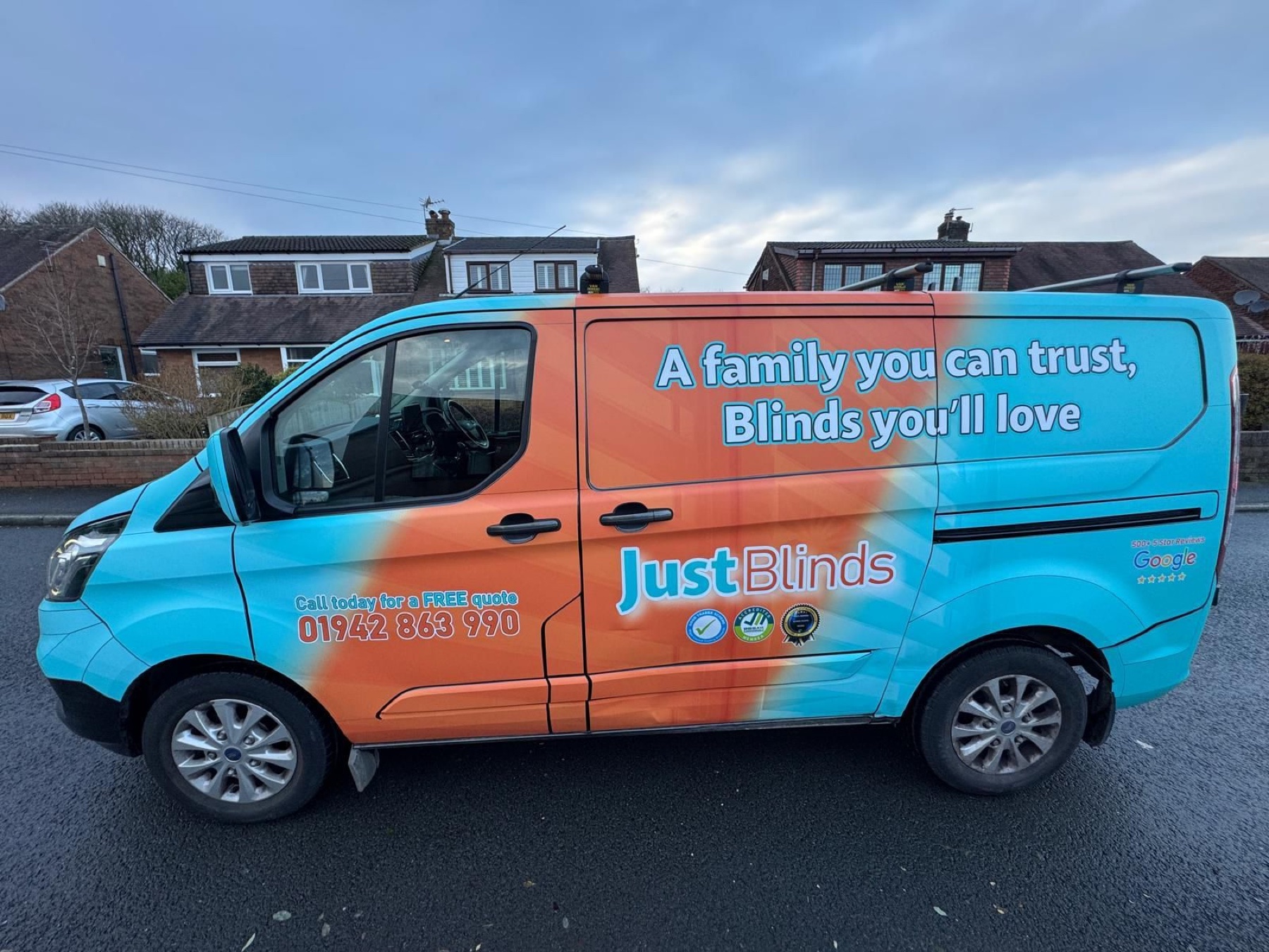 A Just Blinds branded fitting van